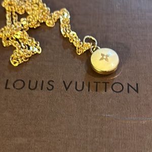 Authentic Louis Vuitton Charm on 20” unbranded gold plated chain